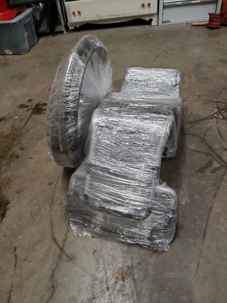 Shrink wrapped wheelchair.